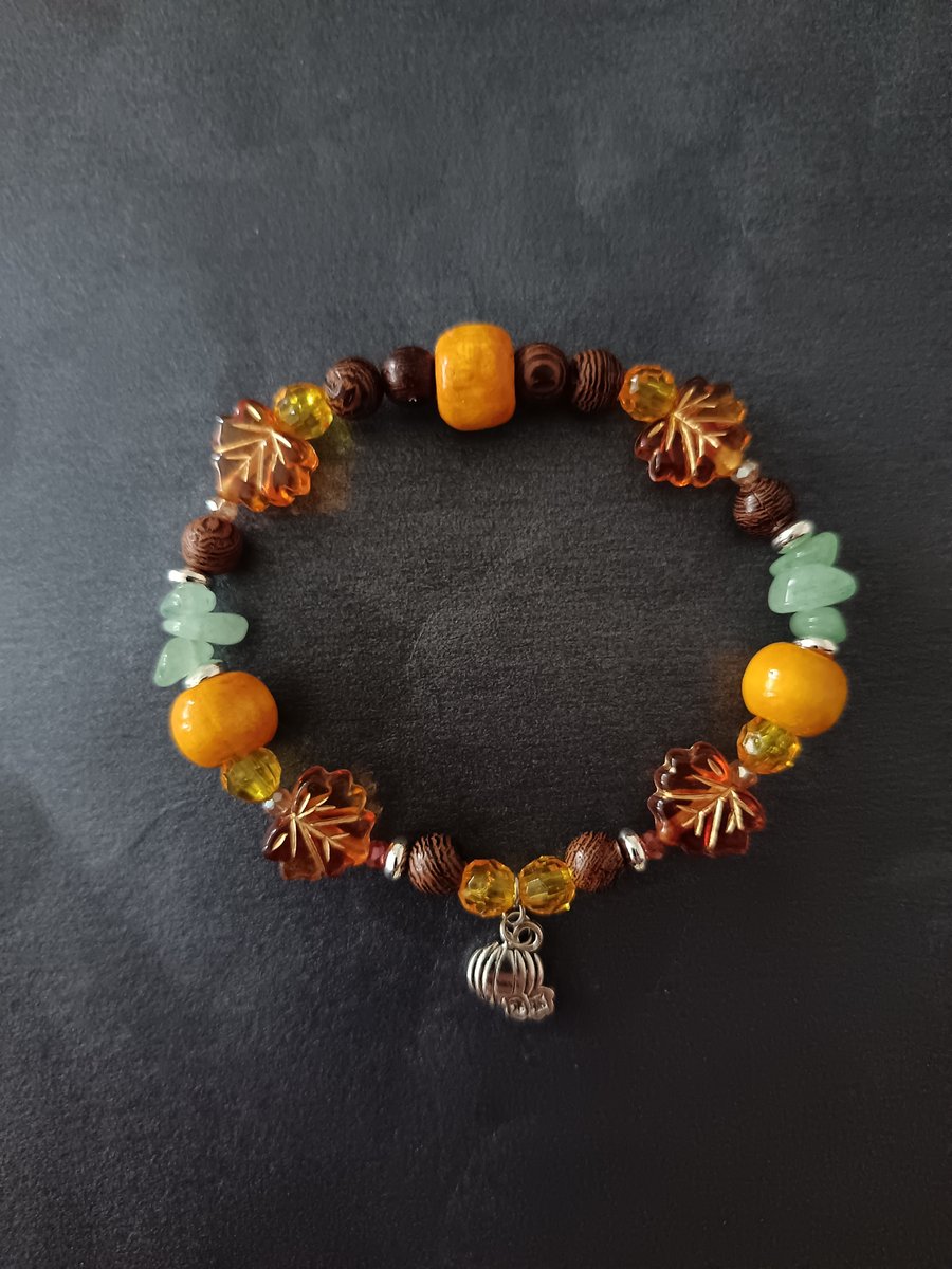 Elasticated Autumnal beaded bracelet with silver pumpkin charm 
