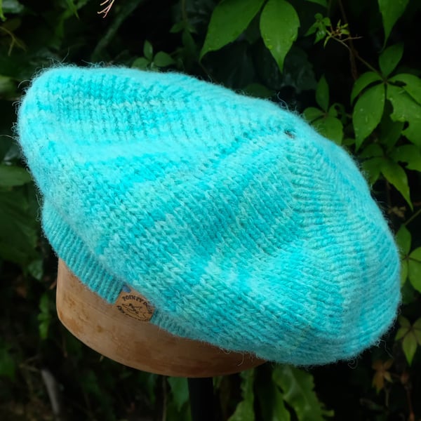 Handmade beret with wool from rescued sheep