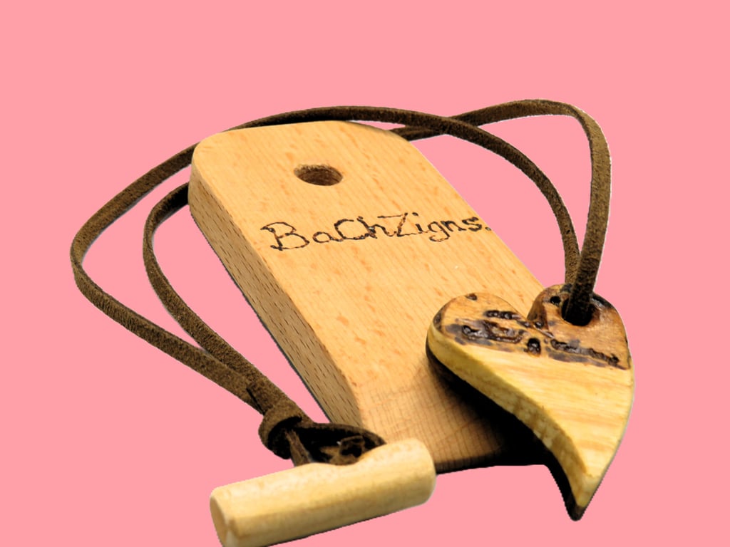 Handcrafted wormy wood heart pendant.SKU-N06