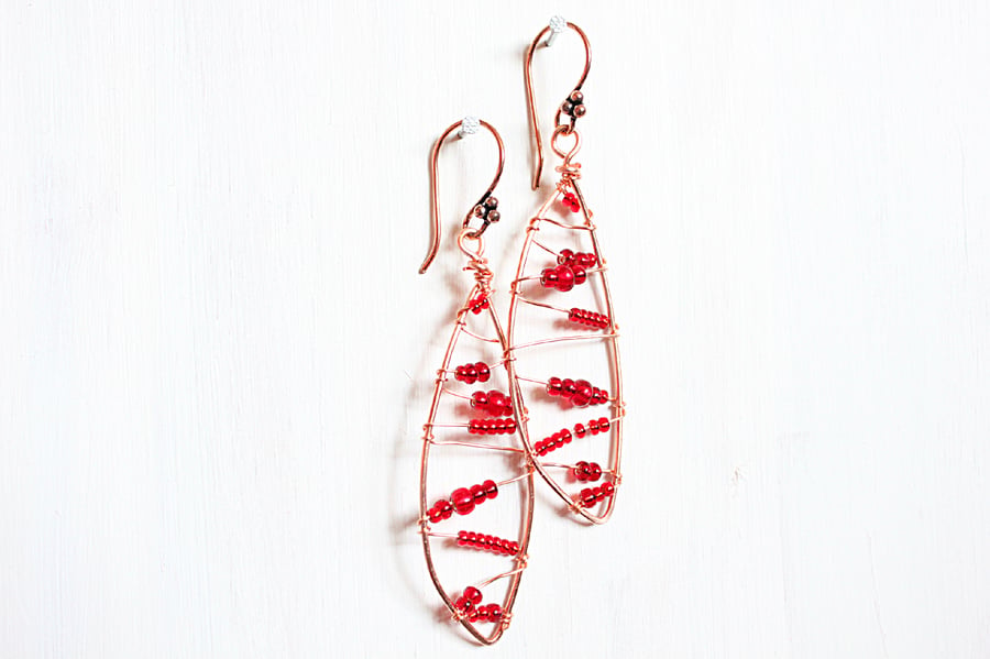 Christmas copper leaf shaped wire wrapped drop earrings with red seed beads