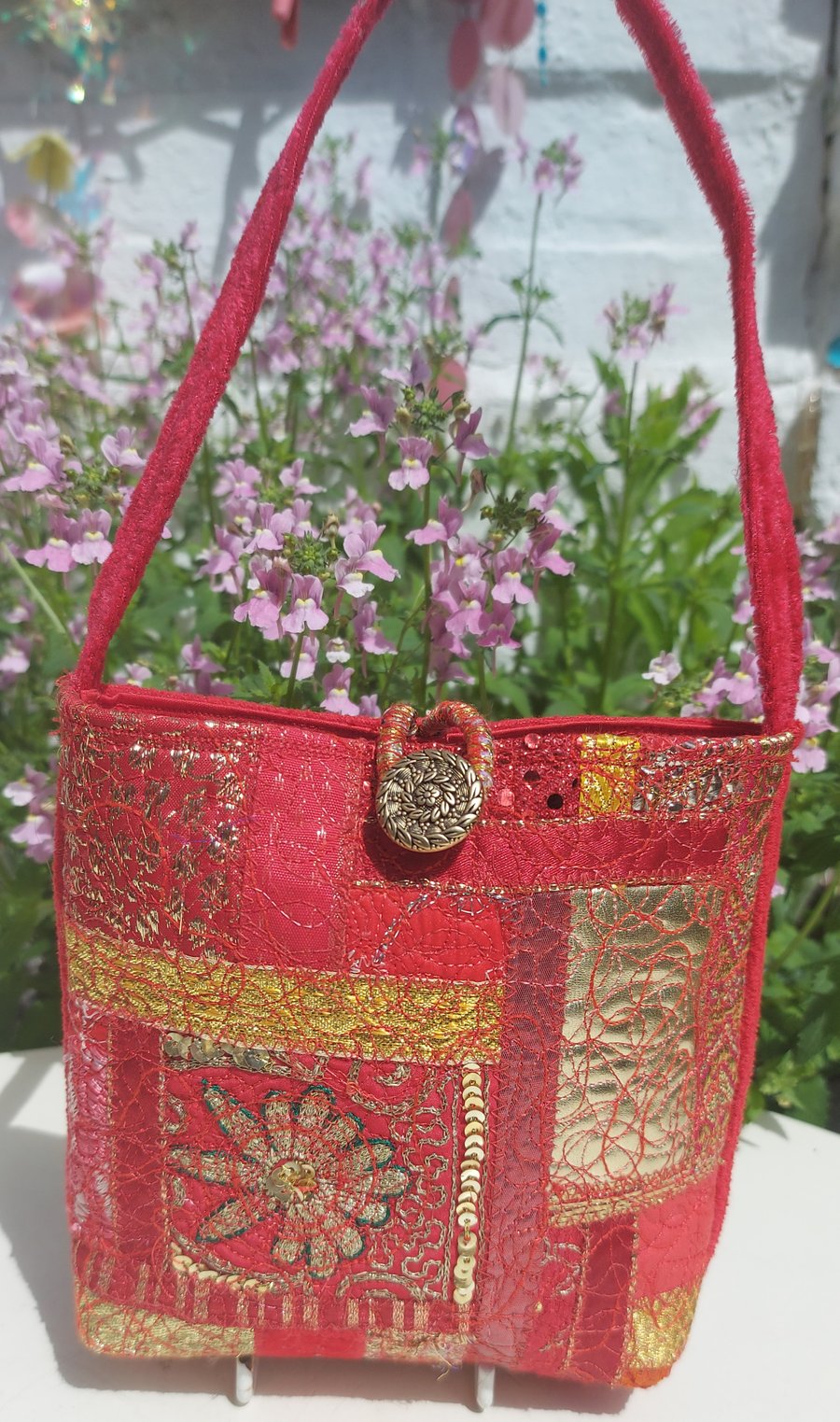 Red and gold crazy patchwork and free hand machine embroidery bag.