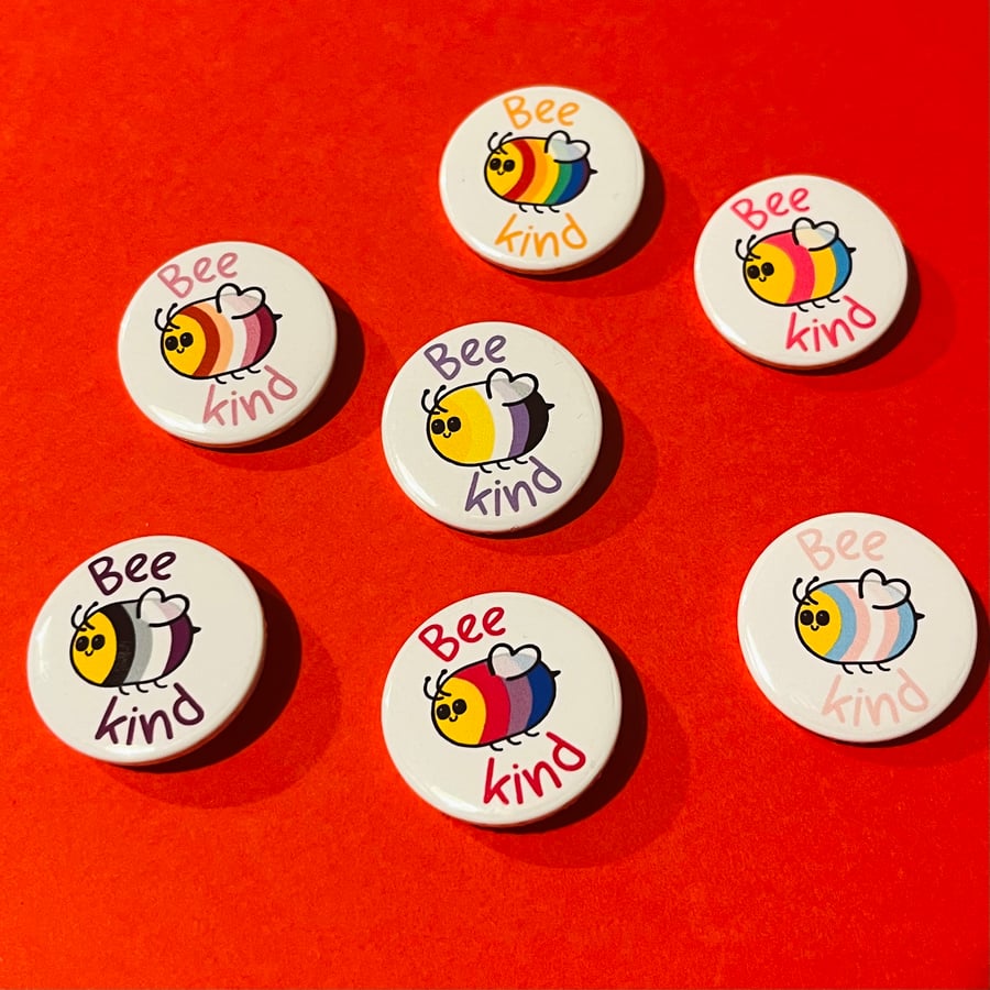 Bee kind pride bee badge, magnet, pocket pebble or keyring.  LGBTQIA Flag