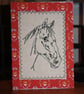Horse head with a red border