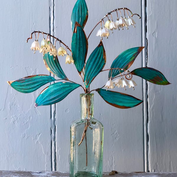 Lily of Valley in a vintage bottle