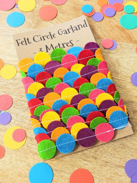 Rainbow circle garland handmade from felt in bright rainbow colours
