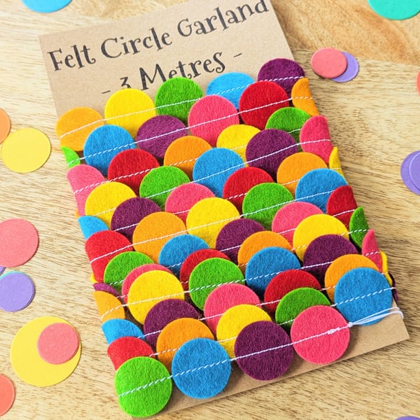 Rainbow circle garland handmade from felt in bright rainbow colours