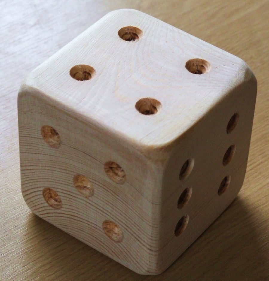 Large wooden dice or die. Ideal for young child.