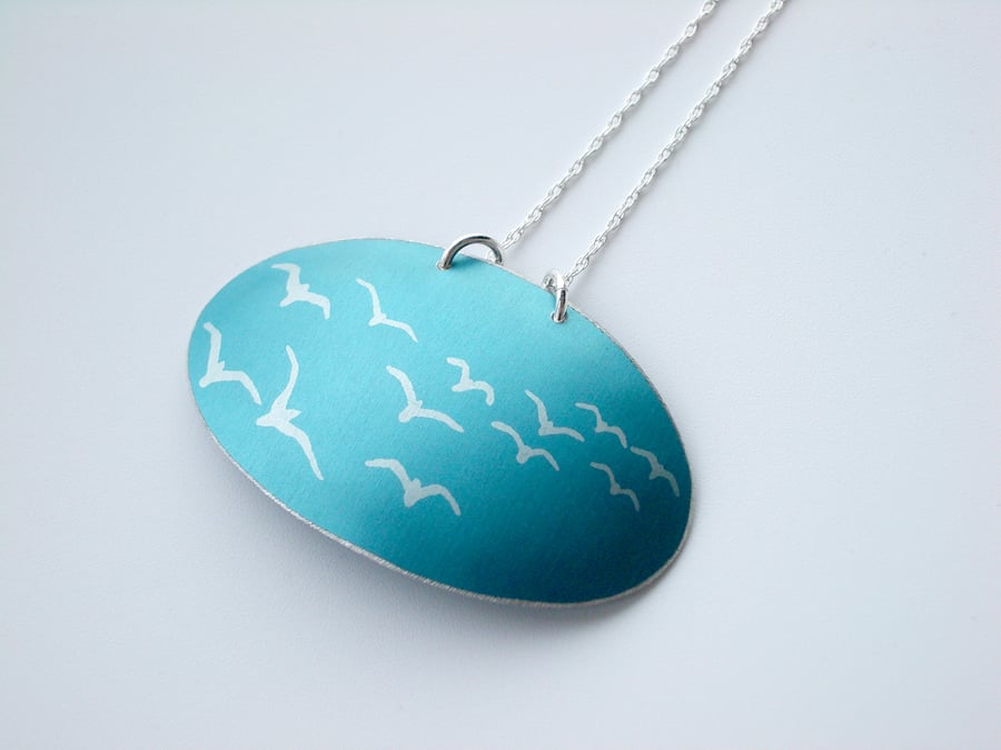 Seagull pendant in blue and silver