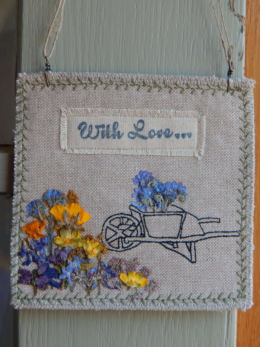 Wheel Barrow and pressed wild flowers - fabric hanger