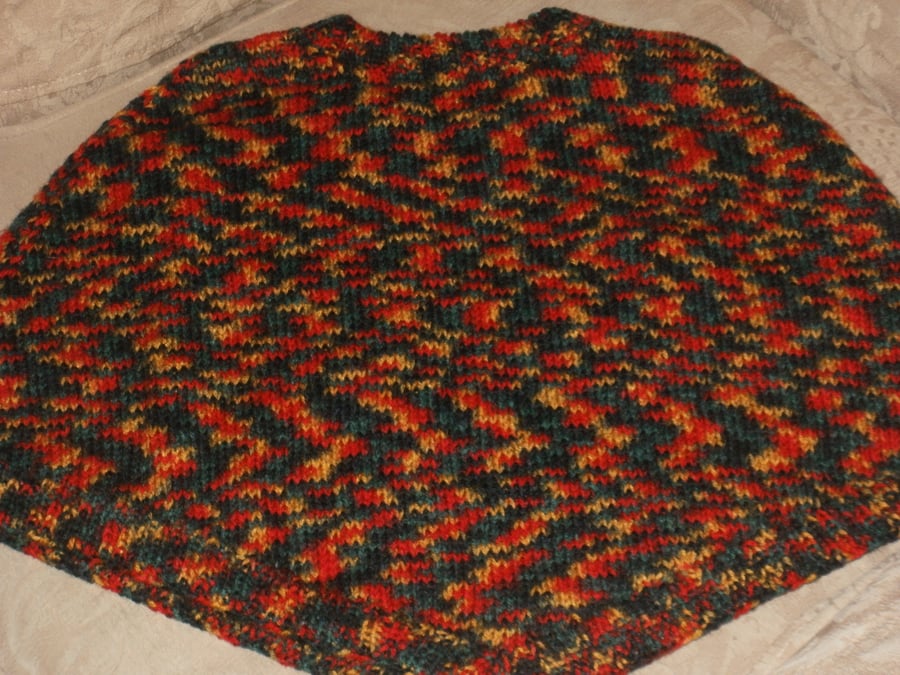 Hand knitted child's poncho