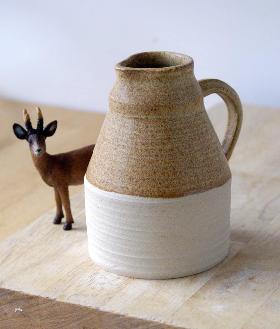 Tall pottery pouring jug glazed in natural brown - wheel thrown stoneware