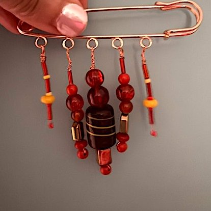 Lovely glass and copper pin. Decorative brooch.