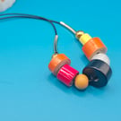Fun and quirky paper beaded necklace on a cord