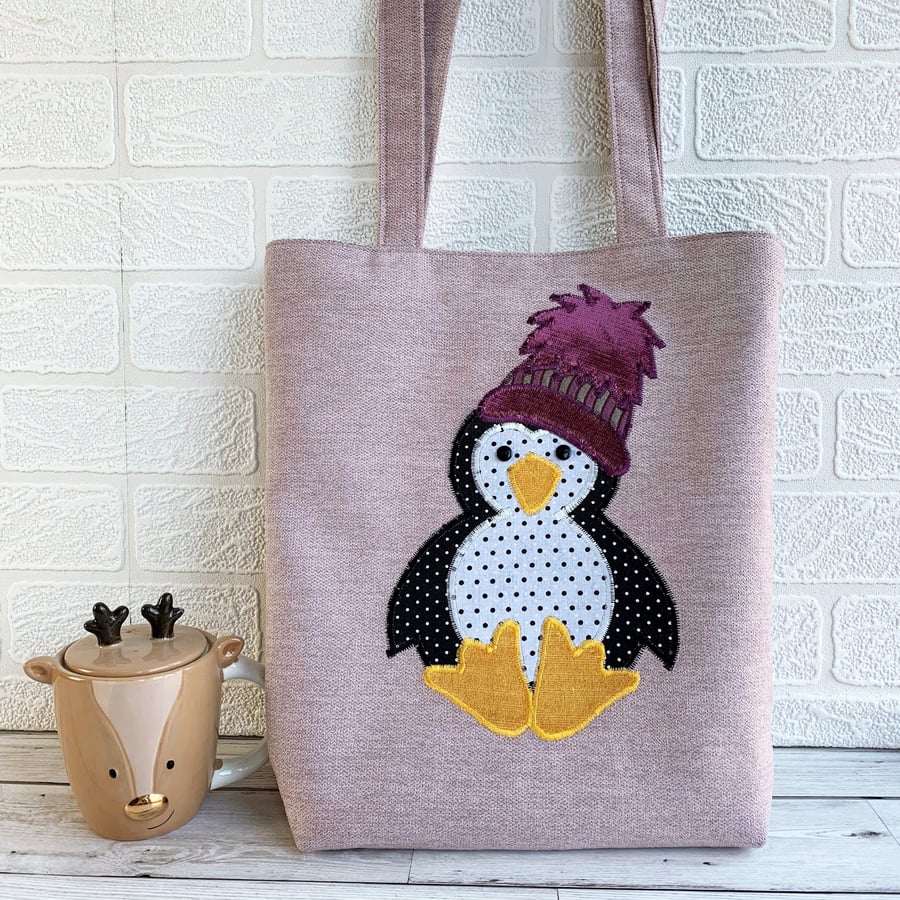 Penguin tote bag in lilac with a polka dot penguin in a purple bobble hat