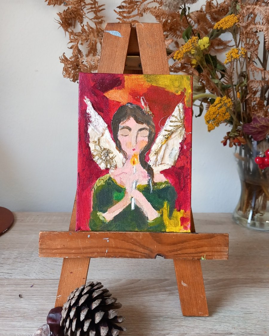 Christmas fairy . Mixed media painting on canvas board