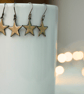 Enamel Star Dangly Earrings - Image 1