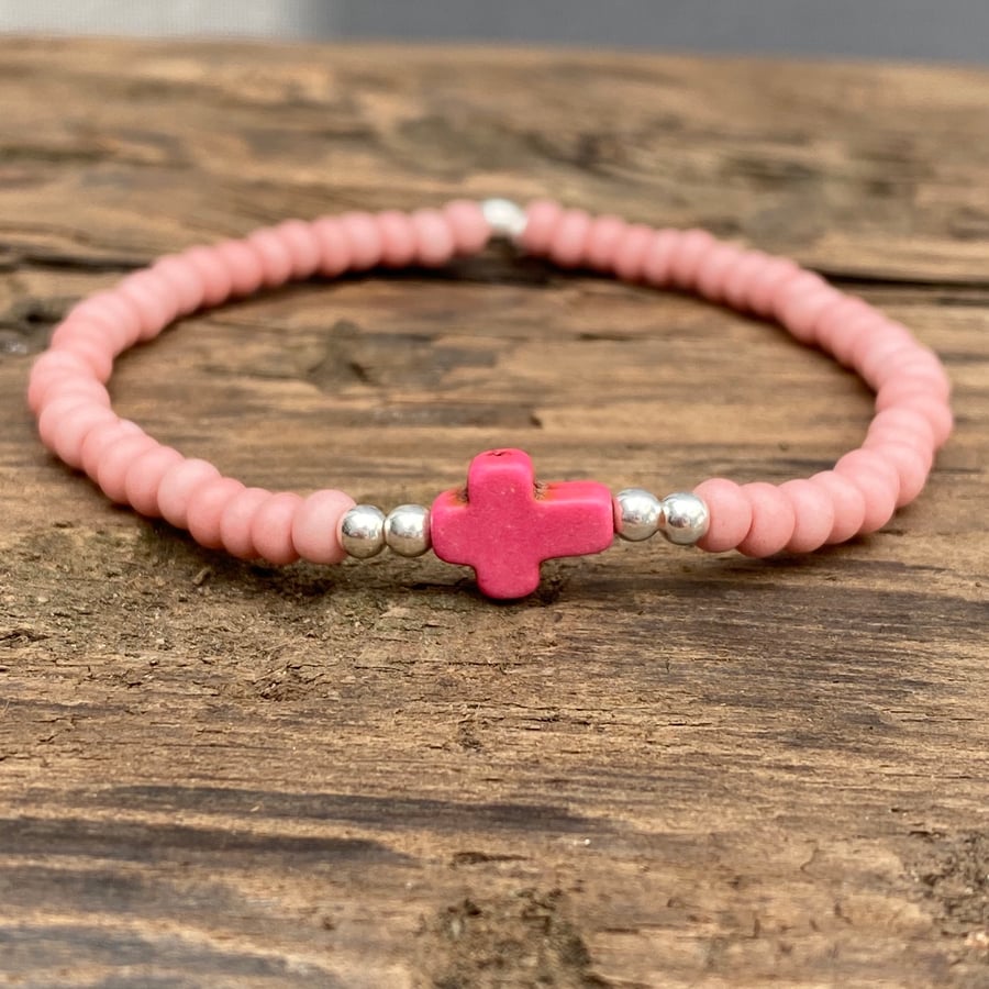 Pink howlite cross and pink seed bead bracelet 
