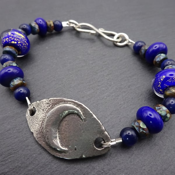 blue lampwork glass bracelet, pewter moon jewellery