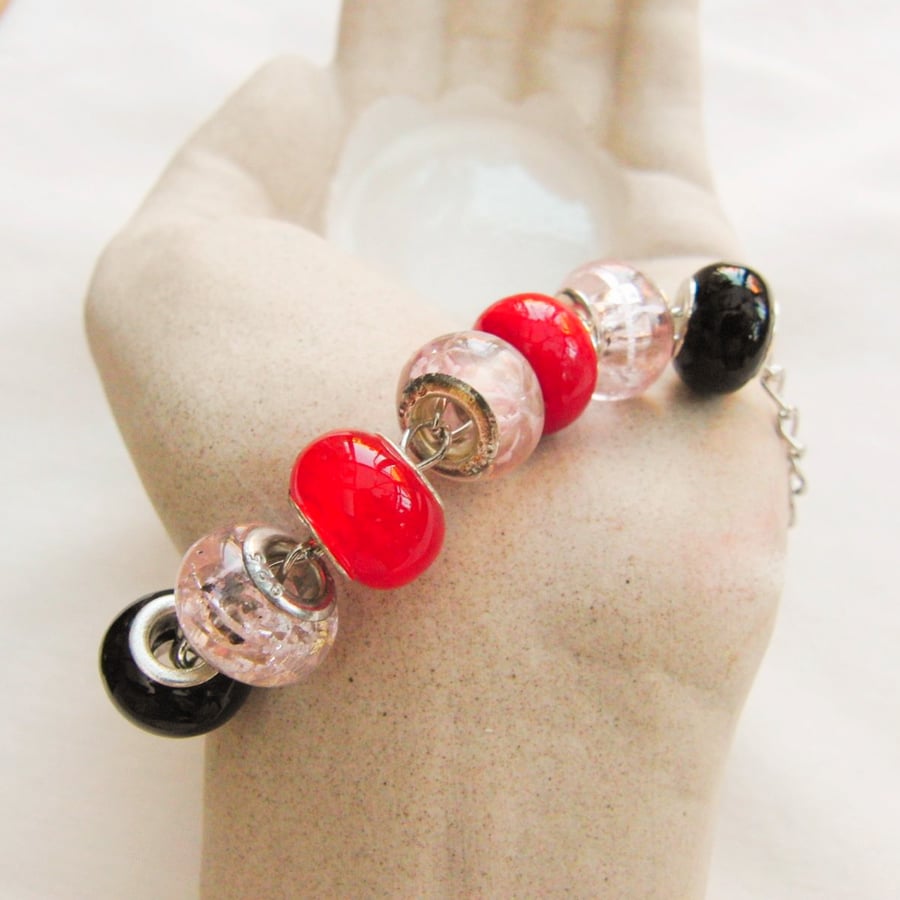 Pink Red and Black European Lampwork Bead Bracelet on a Silver Plated Chain