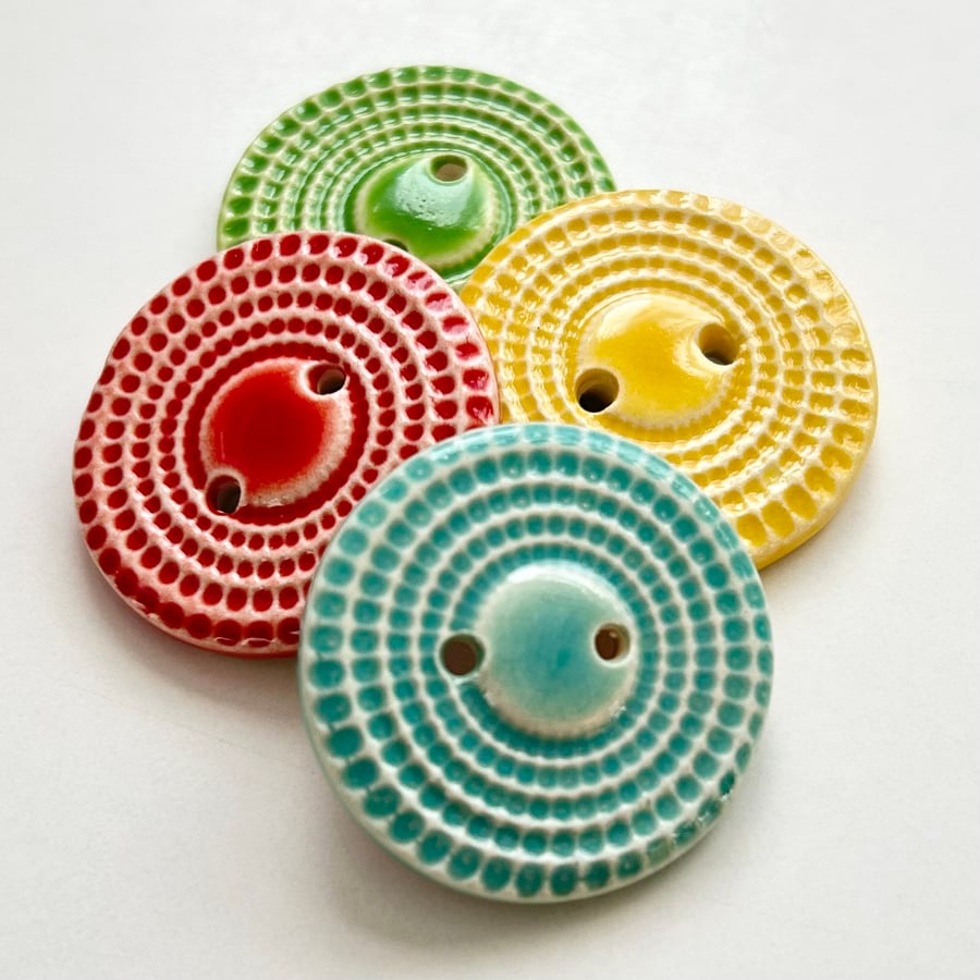 Set of four handmade ceramic buttons