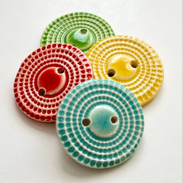 Set of four handmade ceramic buttons