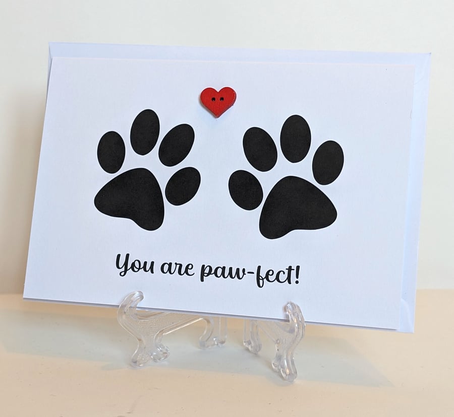 "You are paw-fect" with pawprints and a red heart button greetings card 