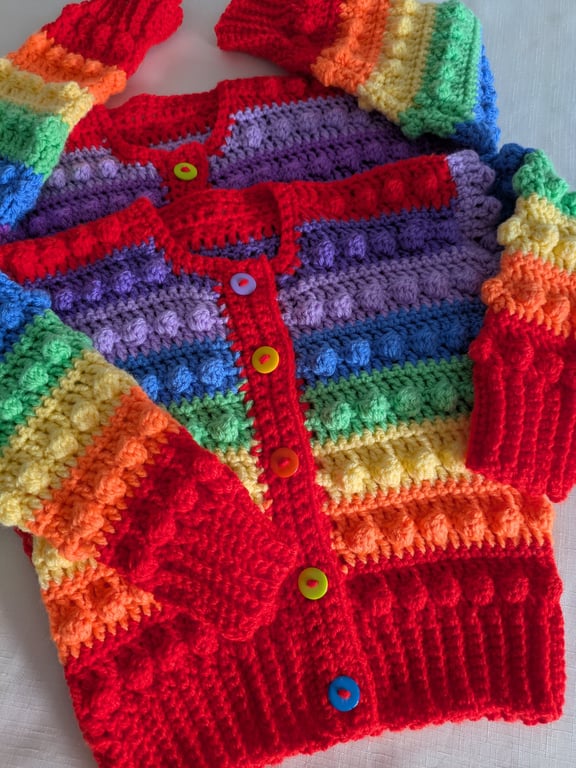 Rainbow coloured cardigans for up to one year old 