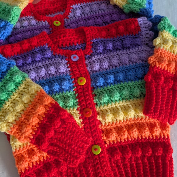 Rainbow coloured cardigans for up to one year old 