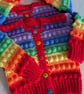 Rainbow coloured cardigans for up to one year old 