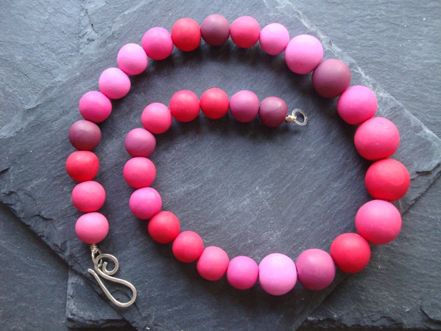 Polymer clay and sterling silver beaded necklace in bright pinks