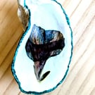 Oyster shell with dried flowers