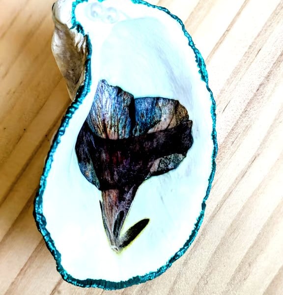 Oyster shell with dried flowers