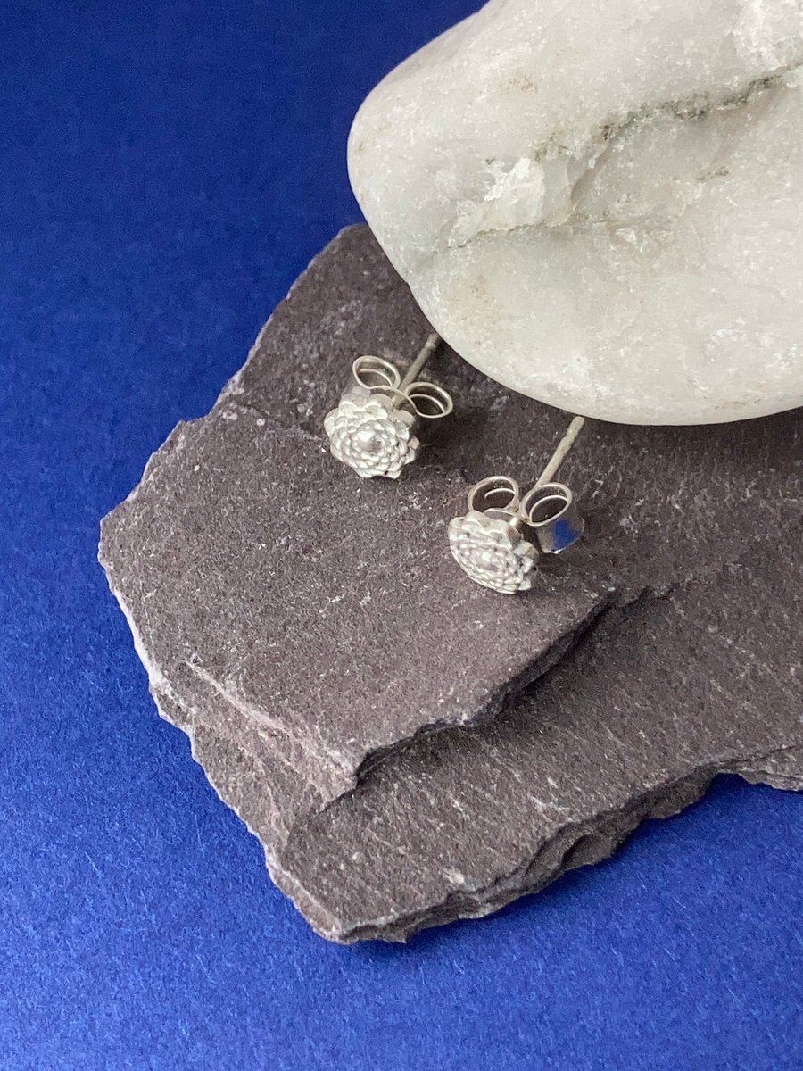 Silver flower stud earrings pair