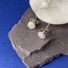 Silver flower stud earrings pair