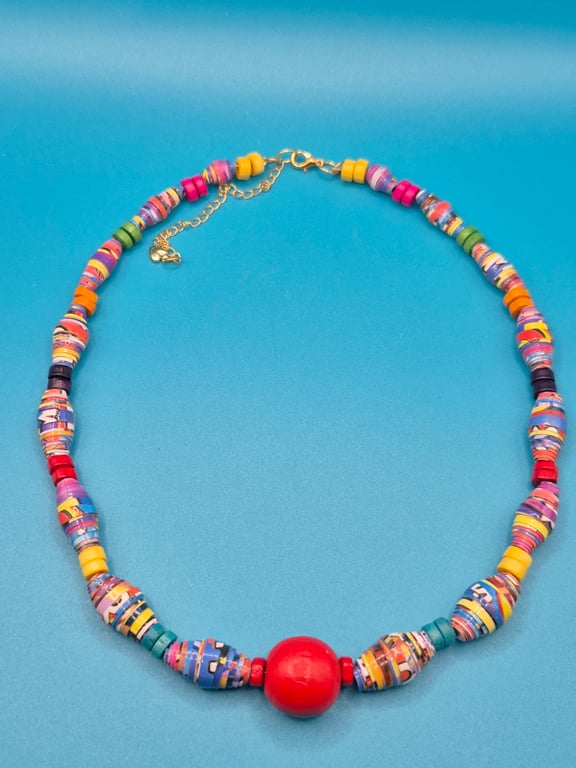 Colourful and vibrant paper beaded necklace made with circus flyers
