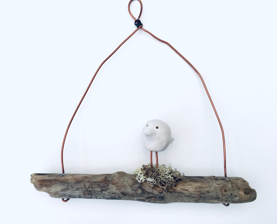 Wire art, bird on a driftwood wire, wire sculpture