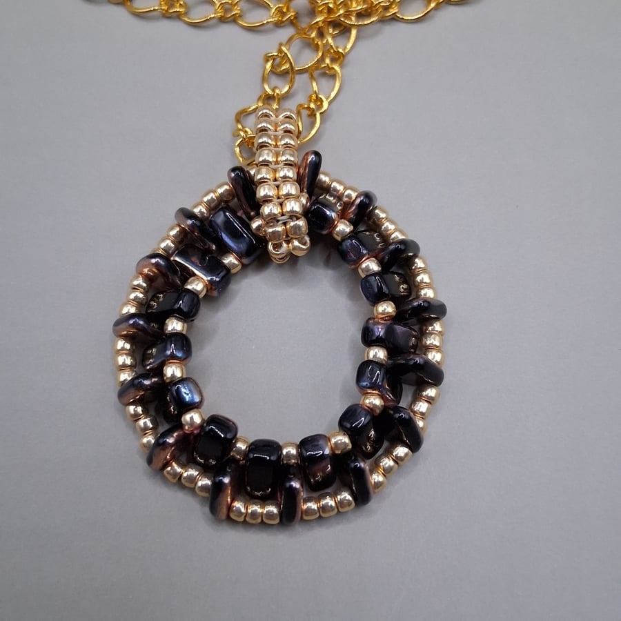 Hand Beaded Black & Gold Circular Pendant Necklace