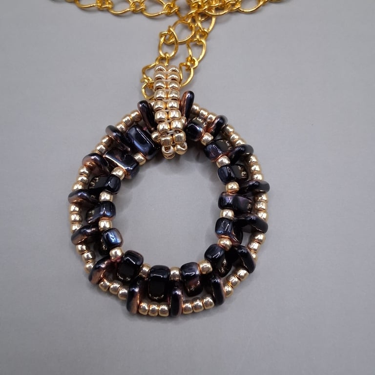 Hand Beaded Black & Gold Circular Pendant Necklace