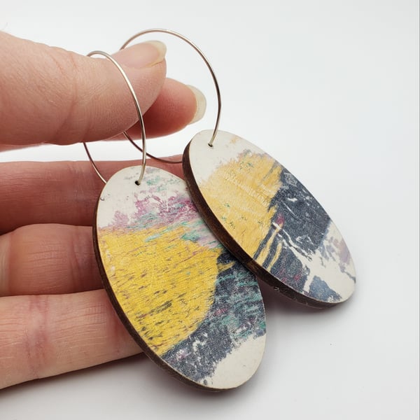 Large hand printed oval earrings in a navy, gold and white print