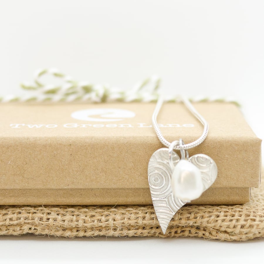 Silver Necklace with a Contemporary Heart charm and Freshwater Pearl