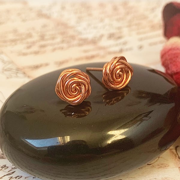 Rose stud earrings, copper