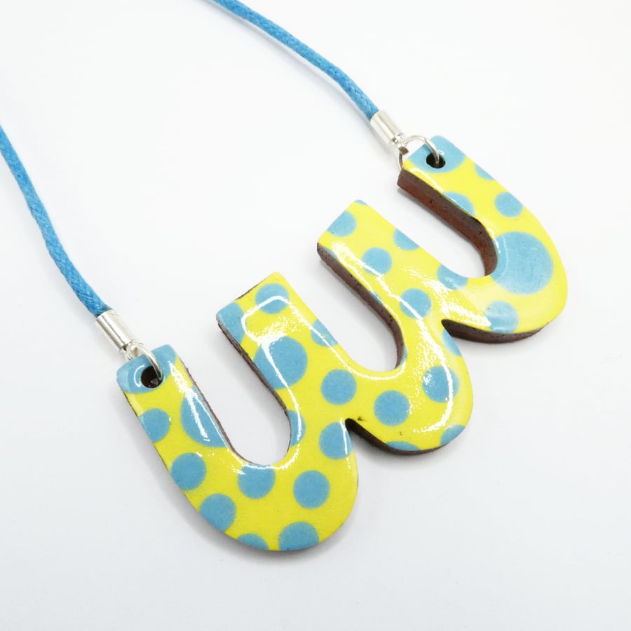 Polka dot bib necklace in yellow and blue