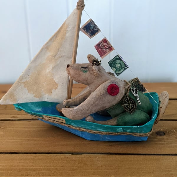 Handmade mixed media bear in a boat 