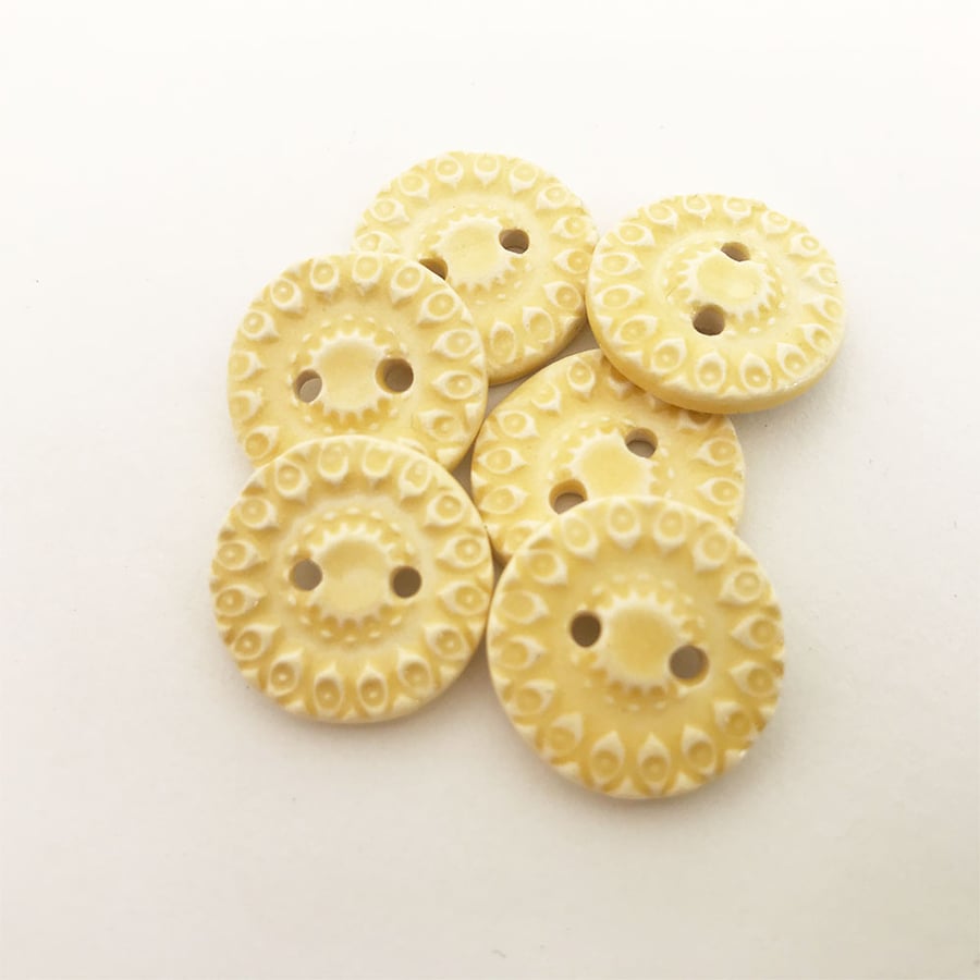 Set of six little handmade ceramic buttons yellow