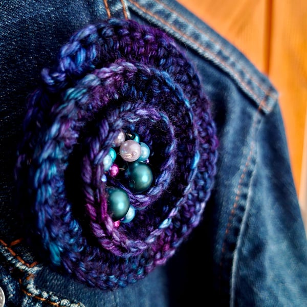 Crocheted brooch with beads - blue shades