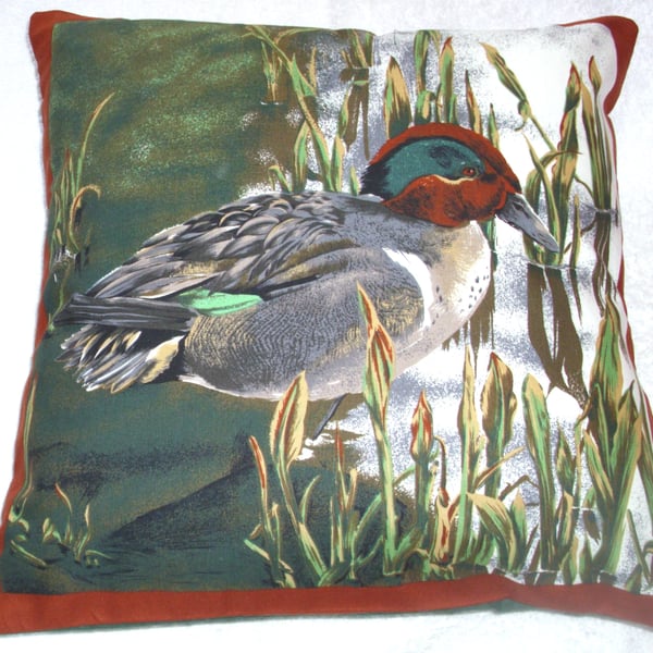 A Duck (Teal) standing by waters edge cushion