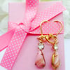  Vintage pink glass earrings with frosted crystal rhinestone.  