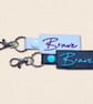 Brave Keyring - Positive Embroidered Faux Leather Bag Charm - Image 1