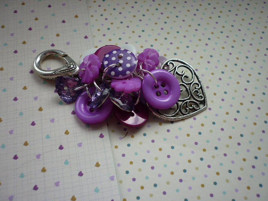 PINKS, PURPLES AND SILVER HANDBAG CHARMS.