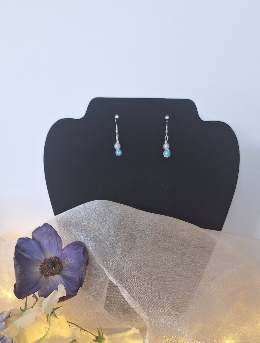 Pearl- effect and blue bead earrings